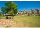 Neighborhood showcasing well-maintained landscaping, trees, and charming homes at 3495 Delegate Aly, Scottdale, GA 30079