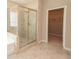 A well-appointed bathroom features a shower with glass doors and a walk-in closet at 3495 Delegate Aly, Scottdale, GA 30079