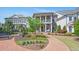 Charming two-story home boasts a landscaped front yard and inviting brick pathway at 74 Academy St, Alpharetta, GA 30009