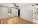 Open bedroom with wood floors shows access to the bathroom and closet at 2374 Marion Cir, Decatur, GA 30032