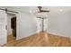 Spacious bedroom with walk-in closet, hardwood floors, and a bathroom with barn door at 2374 Marion Cir, Decatur, GA 30032