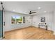 Sun-filled living room with beautiful hardwood floors and contemporary design at 2374 Marion Cir, Decatur, GA 30032