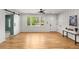 Bright and airy living room featuring new hardwood floors, and modern decor at 2374 Marion Cir, Decatur, GA 30032