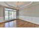 Bright dining room featuring hardwood floors and ample natural light at 3237 Birkdale Ave, Duluth, GA 30097