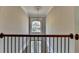 View of foyer features a chandelier above, window bringing in natural light, and staircase at 3237 Birkdale Ave, Duluth, GA 30097