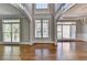 Elegant foyer with hardwood floors and arched entryways at 3237 Birkdale Ave, Duluth, GA 30097