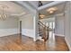 Bright foyer showcasing hardwood floors and decorative lighting at 3237 Birkdale Ave, Duluth, GA 30097