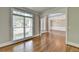 Open foyer featuring hardwood floors, large window, and arched entryway with great flow at 3237 Birkdale Ave, Duluth, GA 30097