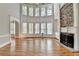 Bright great room with a fireplace, large windows and hardwood floors with great views at 3237 Birkdale Ave, Duluth, GA 30097