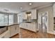 Spacious kitchen features granite countertops, stainless steel appliances, and hardwood floors at 3237 Birkdale Ave, Duluth, GA 30097