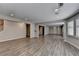Large open living room with wood floors, recessed lights and access to other rooms at 3237 Birkdale Ave, Duluth, GA 30097