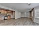 Spacious recreation room with wood floors, recessed lighting, and a wet bar area at 3237 Birkdale Ave, Duluth, GA 30097