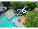 Stunning community pool includes an exciting water slide and relaxing seating areas at 3237 Birkdale Ave, Duluth, GA 30097