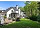Large backyard with manicured lawn, gazebo, and landscaped garden, perfect for outdoor entertaining at 725 Riley Pl, Atlanta, GA 30327