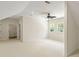 Large bedroom featuring neutral carpeting and an open floor plan at 725 Riley Pl, Atlanta, GA 30327