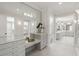 Luxury dressing room with vanity and mirror with walk-in closet and bathroom at 725 Riley Pl, Atlanta, GA 30327