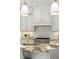 Modern kitchen with granite countertops, stainless steel appliances, and stylish backsplash at 725 Riley Pl, Atlanta, GA 30327