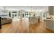 Open kitchen and living space with hardwood floors and stainless steel appliances at 725 Riley Pl, Atlanta, GA 30327