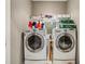 Convenient laundry room with modern washer and dryer units for efficient chores at 1276 Edmund Ne Ln, Brookhaven, GA 30319