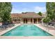 Community pool with lounge chairs for relaxing in a luxurious environment at 1276 Edmund Ne Ln, Brookhaven, GA 30319