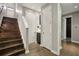 Inviting staircase with hardwood steps and white risers leads to upper levels of the home at 1276 Edmund Ne Ln, Brookhaven, GA 30319