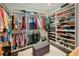 Organized walk-in closet with custom shelving and ample storage for clothes, shoes, and accessories at 1276 Edmund Ne Ln, Brookhaven, GA 30319