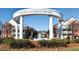 The Smyrna Market Village entrance with shops, fountain and landscaping at 2610 Knoll Se Rd, Smyrna, GA 30080