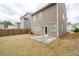 Backyard showcasing a concrete patio and green space at 275 Denver Ave, Hiram, GA 30141