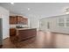 Open kitchen area featuring a large island and hardwood floors, blending seamlessly with living space at 275 Denver Ave, Hiram, GA 30141