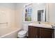 A modest bathroom offers a tub/shower combination and single sink vanity at 3742 Linecrest Rd, Ellenwood, GA 30294