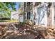View of the home's front door, garage, and a neatly maintained front yard with some rocks at 3742 Linecrest Rd, Ellenwood, GA 30294