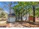Charming two-story home featuring a manicured lawn, attached garage, and traditional architectural details at 3742 Linecrest Rd, Ellenwood, GA 30294