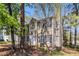 Charming two-story home featuring a manicured lawn, attached garage, and traditional architectural details at 3742 Linecrest Rd, Ellenwood, GA 30294