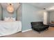 Bonus room features a sofa and a bed perfect for an at home office or guest room at 4735 Longcourt Se Dr, Atlanta, GA 30339