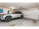 Attached garage features parking for one car and storage space at 4735 Longcourt Se Dr, Atlanta, GA 30339