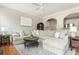 Spacious living room featuring hardwood floors, modern decor, and lots of natural light at 4735 Longcourt Se Dr, Atlanta, GA 30339