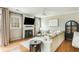 Living room with fireplace and large windows offering natural light at 4735 Longcourt Se Dr, Atlanta, GA 30339