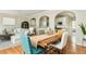 Open-concept living space featuring a dining area, kitchen, and living room at 4735 Longcourt Se Dr, Atlanta, GA 30339