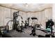 Basement gym area fully equipped with exercise machines and free weights at 1023 Bentley Estates Dr, Dacula, GA 30019