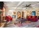 Open-concept living room featuring hardwood floors and arched doorways to other rooms at 1023 Bentley Estates Dr, Dacula, GA 30019