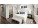 Charming bedroom with ensuite bathroom, hardwood floors, and modern decor at 1123 W Marietta St, Atlanta, GA 30318