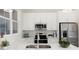 Modern kitchen featuring white cabinets, stainless steel appliances, and quartz countertops at 1123 W Marietta St, Atlanta, GA 30318