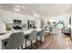 Open-concept kitchen and living area with stainless steel appliances and modern finishes at 1123 W Marietta St, Atlanta, GA 30318