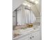 Bathroom with stone countertops, white cabinets and mirror at 1711 Homestead Ne Ave, Atlanta, GA 30306
