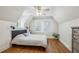 Bedroom with wood floors, a ceiling fan, a closet and lots of natural light at 1711 Homestead Ne Ave, Atlanta, GA 30306