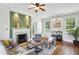 Comfortable living room featuring a fireplace, hardwood floors, and neutral decor at 1711 Homestead Ne Ave, Atlanta, GA 30306