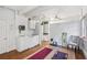 Bright living space with hardwood floors, natural light, kitchenette and fitness area at 1711 Homestead Ne Ave, Atlanta, GA 30306