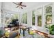 Bright sunroom with hardwood floors, multiple windows, and a relaxing atmosphere at 1711 Homestead Ne Ave, Atlanta, GA 30306