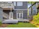 View of backyard with a two-level deck and outdoor seating at 327 6Th Ne St, Atlanta, GA 30308