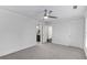 Bedroom featuring neutral colors, closet, ceiling fan, and an ensuite bathroom at 327 6Th Ne St, Atlanta, GA 30308